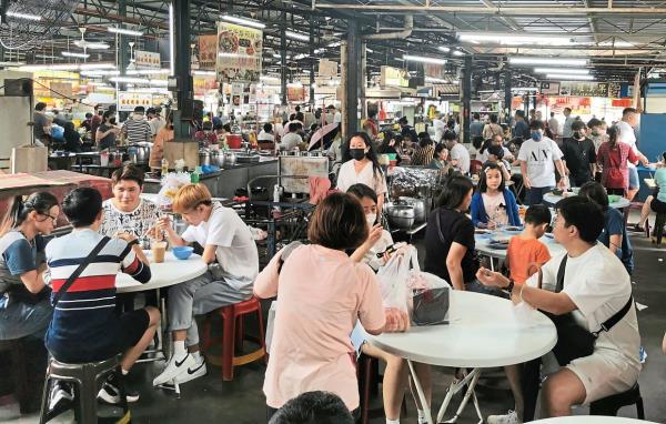 Be patient, you will eventually find a table at the food court located in Cecil Street Market. — K.T. GOH/The Star