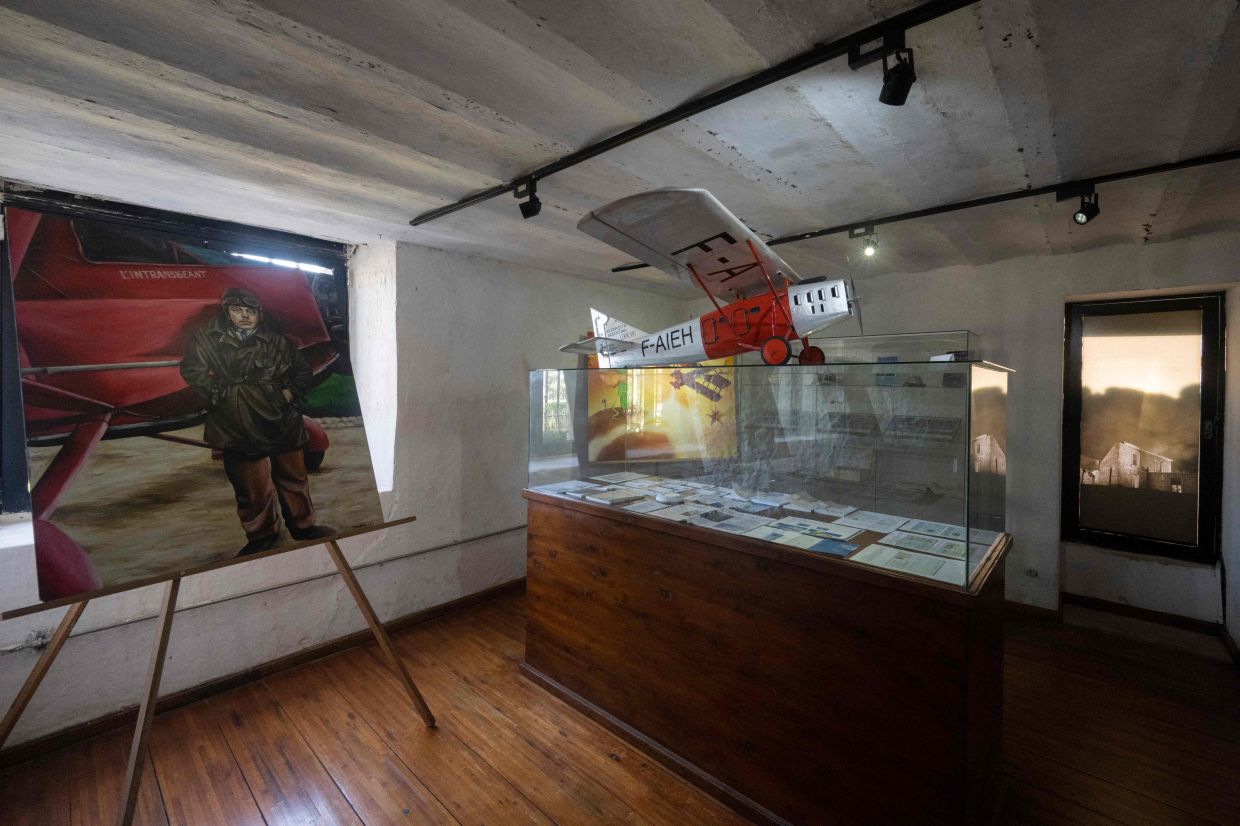 Objects related to French writer, poet, journalist and pio<em></em>neering aviator Antoine de Saint Exupery and his book 'The Little Prince' are displayed at the San Carlos Castle. Photo: AFP