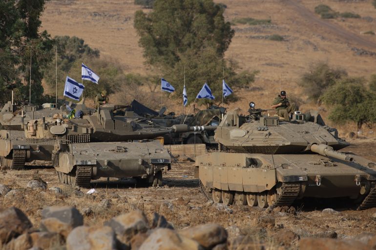 Israeli Merkava tanks are positio<em></em>ned in the upper Galilee in northern Israel near the border with Lebanon